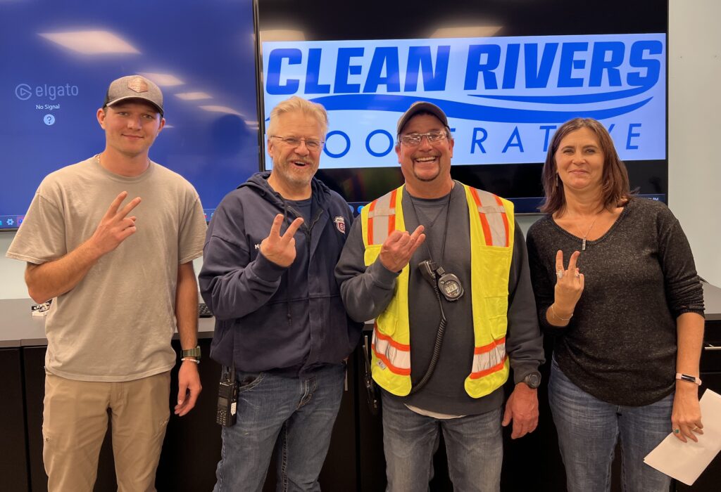 2023 Boom Rodeo 2nd place winners from Phillips 66 pose with Clean Rivers Staff